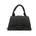 Minimalist black trapezoid handbag with textured fabric and unique buckle detail - Black