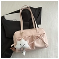Pink shoulder bag with front pockets, bows, and a plush cloud charm on white fabric - Pink With Charm