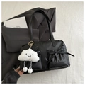 Detail of black tote bag with bow pocket and cute white cloud charm on white cloth - Black with Pendant
