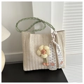 Sac seau tissé beige avec anses tressées vertes et charme floral pour l'été - Vert