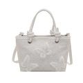 Bolso tote de encaje blanco con bordados de mariposas 3D y elegante asa con nudos - Blanco