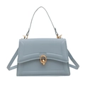 Minimalist light blue leather crossbody bag with geometric lines and gold ring buckle - Blue