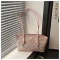 Detail of 3D butterfly embroidery and floral lace texture on pink shoulder bag - Pink