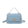 Light blue minimalist leather handbag with gold metal clasp and adjustable shoulder strap - Blue