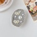Détail du support téléphone avec papillon en perles et cœur au style rétro français - Support Transparent-Feuille d'Argent-Nœud Cœur