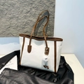 Borsa tote retrò capiente in tela bianca con finiture a contrasto in pelle marrone - Bianco Con Pendente