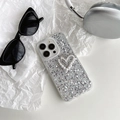 Close-up of glitter iPhone case with white faux pearl heart and silver sequins - Silver Glitter Hollow Double Heart / iPhone 7/8/SE 2020