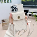 Detail of cream white leather iPhone case with gold flower clasp and crossbody strap - Apricot / iPhone 7/8/SE 2020
