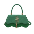 Green textured shoulder bag with woven glitter flap and metallic tassel detail - Green