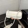 Minimalist white faux leather baguette shoulder bag with gold lettering and slim strap - White