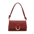 Elegant red woven texture shoulder bag with golden horseshoe buckle and chic knot straps - Red