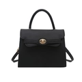 Structured black leather handbag with golden twist lock and top handle for commuting - Black