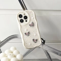 Detail of cream wave-edge phone case with butterfly ribbons, pearls and glitter sequins - Gemstone Bow - Creamy White / iPhone 7/8/SE 2020