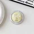 Detail of magnetic phone grip with white pearl bow and Gift For You star pattern - Yellow