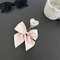 Supporto per telefono con fiocco in raso rosa e anello in metallo a forma di cuore - Rosa