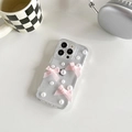 Detail of pink silk bows and pearls on glitter transparent iPhone case with logo - iPhone 7/8/SE 2020 / Pink