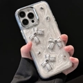 Dettaglio custodia glitter bianco perla con fiocchi argentati e strass scintillanti - Cornice Galvanizzata-Glitter Bianco-Triplo Fiocco-Bianco / iPhone 7/8/SE 2020