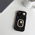 Detail of black wave edge phone case with glitter, gold tulip relief and pearl accents - Black / iPhone 7/8/SE 2020