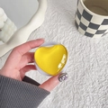Dettaglio di un supporto per telefono a cuore giallo lucido con base estensibile - Supporto Magnetico-Cuore in Vetro di Cristallo-Giallo