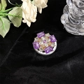 Detail of flower-shaped MagSafe phone grip with purple crystals and pearls on velvet - X-Shape Gemstone Purple Style 41