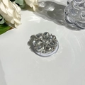 Close-up of a sparkling crystal flower MagSafe phone socket with luxury rhinestones - Gemstone Style 10 - White