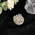 Close-up of luxury magsafe phone stand with radiant clear crystals and gold metal finish - X-Shape Gemstone White Style 41