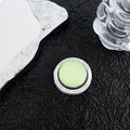 Close-up of magnetic phone grip with light green finish and Gift For You engraving - Light Green