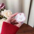 Close-up of cute pink rabbit folding phone grip held in hand with floral background - Magnetic Rabbit Holder - Pink