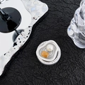 Detail of creative phone grip with pearl and amber gem design on textured background - Brown Smudge Pearl Style