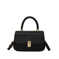 Contrast sequin crossbody bag with gold turn-lock and adjustable shoulder strap - Black