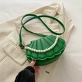Forest green shell-shaped crossbody bag with pearl chain and elegant quilted texture - Green