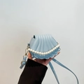 Light blue shell shaped crossbody bag with pearl strap and golden hardware - Blue