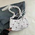 White floral shoulder bag with ruched handle and bow detail for a vintage style - White