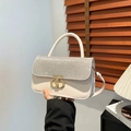 Elegant white leather handbag with sparkling glitter flap and gold clasp detailing - Gold