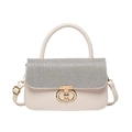 Elegant cream white and silver crossbody bag with a golden circular twist lock - Gold