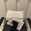 White glossy patent leather shoulder bag with wavy flap design and gold hardware - White