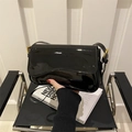 Glossy black patent leather shoulder bag with gold hardware and magnetic flap closure - Black