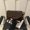 Deep brown patent leather shoulder bag with sleek flap and gold metallic buckle - Brown