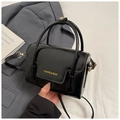 Glossy black oil wax leather handbag with magnetic flap and FASHION & BAGS lettering - Black