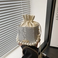 Silver snake pattern bucket bag with pearl handle and golden chain strap for women - Silver