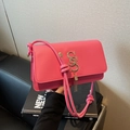 Pink leather square shoulder bag with gold letter logo and metallic tassel decoration - Rose Red