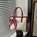 Chic cream snakeskin tote bag with red trim and heart print scarf accent for women - Red