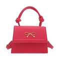 Hot pink trapezoid handbag with gold metal bow and knotted top handle detail - Rose Pink