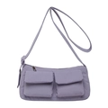 Minimalist lavender lavender crossbody barrel bag with adjustable strap and front pockets - Purple