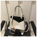 Three-color geometric patchwork crossbody bag with textured leather and dual handles - Khaki