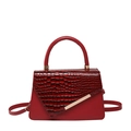 Elegant deep red trapezoid handbag with glossy crocodile texture and gold metal bar detail - Red