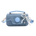 Blue denim crossbody bag with large round buckle and elegant pearl bow charm accessory - Blue with Charm