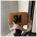 Close-up of brown suede camera bag featuring SM logo and ethnic pattern wide strap - Dark Brown