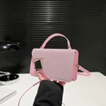 Pink glitter crossbody bag with gold hardware and square clasp for chic commuting style - Pink