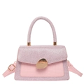 Pink retro crossbody bag with glitter fabric and faux crocodile texture on white background - Pink